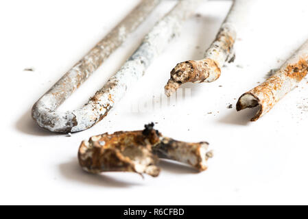 Damaged Heating Element of the Washing Machine on White Background. Stock Photo