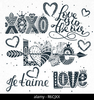 Set of love quotes. Hand drawn lettering. Happy Valentine's Day. Xoxo. Je t'aime. Freehand style. Doodle. Romantic holiday Stock Photo
