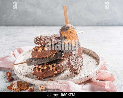 Chia popsicle with raw carrot cake and chocolate Stock Photo