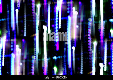 Abstract Blurred Background, Colourful speed and movement lights, Multi toned coloured lights, Mixed blue, purple, gold and green blurred lights Stock Photo