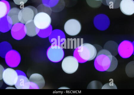 Blue Pink Purple and White Bokeh, Xmas Light Background, soft focus colored lights Stock Photo