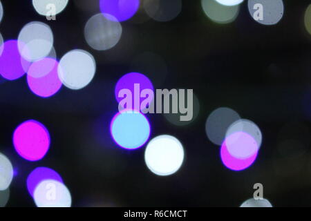 Blue Pink Purple and White Bokeh, Xmas Light Background, soft focus colored lights Stock Photo