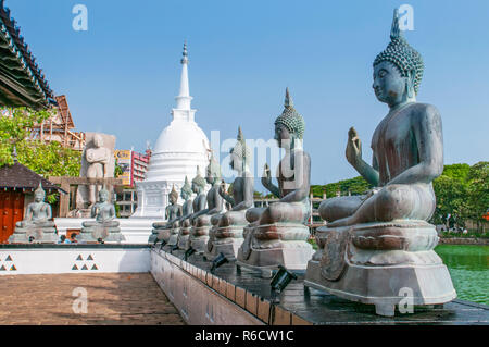 Famous Sitting Buddha Statues And Stupa In The Seema Malaka Temple In Colombo, Sri Lanka This Is Situated On Beira Lake And Is Part Of The Gangaramaya Stock Photo