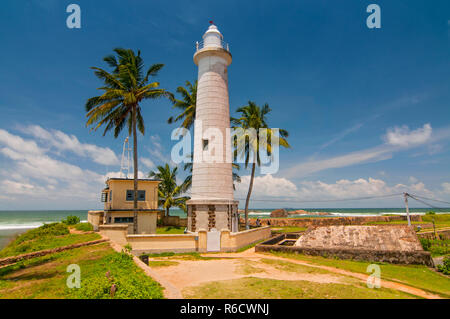 Light House At Galle Dutch Fort 17Th Centurys Ruined Dutch Castle That Is Unesco Listed As A World Heritage Site In Sri Lanka Stock Photo