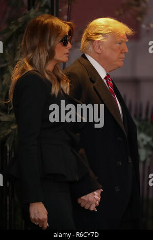 Washington, DC, USA. 04th Dec, 2018. First lady Melania Trump and President Donald Trump leave the Blair House after paying a visit to the family of former President George H.W. Bush December 04, 2018 in Washington, DC, USA. The Trumps were paying a condolence visit to the Bush family who are in Washington for former President George H.W. Bushs state funeral and related honors. Credit: Chip Somodevilla/Pool via CNP | usage worldwide Credit: dpa/Alamy Live News Stock Photo