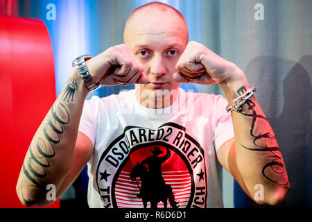 Berlin, Germany. 05th Dec, 2018. Rapper Olexesh is on YouTube Space Berlin for the 2018 YouTube Annual Review and holds his fists up. Credit: Christoph Soeder/dpa/Alamy Live News Stock Photo