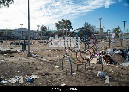 Tijuana, Mexico. 04th Dec, 2018. View on the sports complex Benito Juarez, which was closed because of the floods. Currently more than 6000 migrants from Central America are waiting in the border town of Mexican Tijuana to apply for asylum in the USA. As only a limited number of cases are processed at the San Ysidro border crossing, there are months of waiting time. Credit: Bruno Gallardo/dpa/Alamy Live News Stock Photo