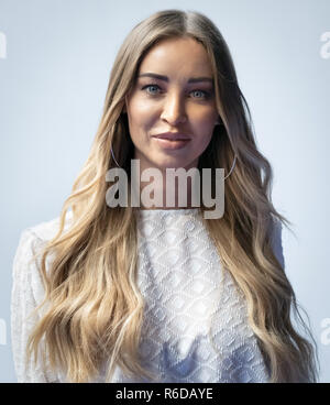 London, UK. 5th Dec, 2018. Lauren Pope, television personality known for her appearances on The Only Way is Essex, attends the annual ICAP Charity Day. Credit: Guy Corbishley/Alamy Live News Stock Photo