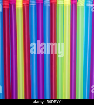 multi-colored plastic cocktail straws Stock Photo