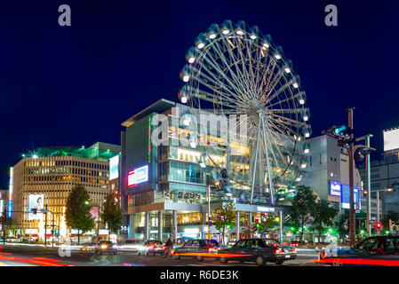street view of nagoya with ferris wheel in japan Stock Photo