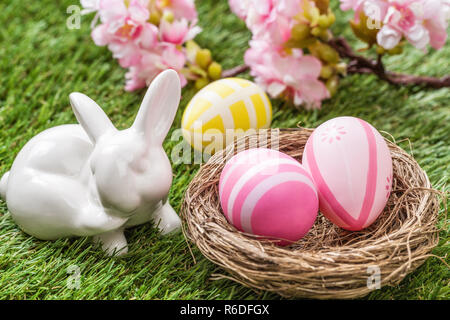 easter basket with colorful eggs Stock Photo