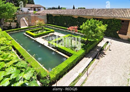 Interior Garden Of Alhambra Fortress In Granada, South Of Spain Stock Photo