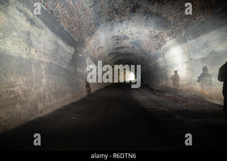 A walk through the disused Glenfarg Railway tunnels in Perth and Kinross Scotland. Stock Photo