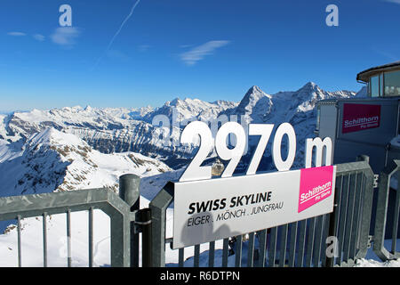 View from Schilthorn mountain restaurant,  Swiss Alps near Murren. 10,000ft / 2970m.  Winter. Location for Bond movie, On Her Majesty's Secret Service Stock Photo