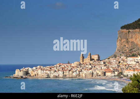 Houses Along The Shoreline And Cathedral In Background Cefalu Sicily Stock Photo