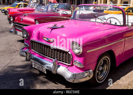 Fancy Old Cars - editorial image - Havana, Cuba. Colorful classic 1950's cars. Photo taken in Havana, Cuba 30 October 2018