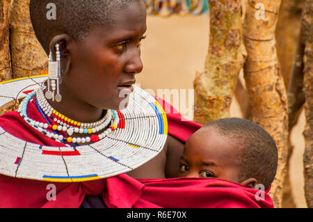 Portrait Of A Maasai Woman From Kenya With Colorful African Bead Necklace Jewelry Around Her Neck Stock Photo