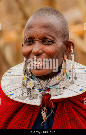 Portrait Of A Maasai Woman From Kenya With Colorful African Bead Necklace Jewelry Around Her Neck Stock Photo