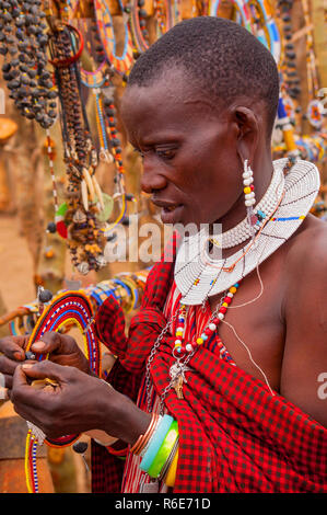 Portrait Of A Maasai Woman From Kenya With Colorful African Bead Necklace Jewelry Around Her Neck Stock Photo