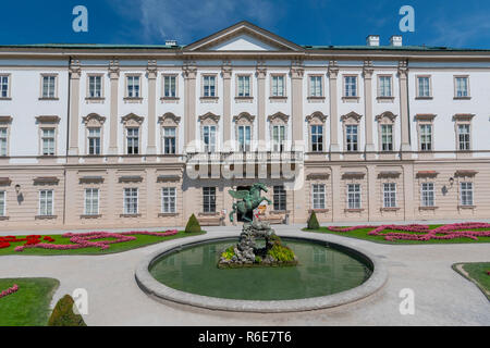 Facade Of Schloss Mirabell Palace, With A Bronze Pegasus On Pegasus Fountain In Front, Sculptor Kaspar Gras, Salzburg Austria Stock Photo