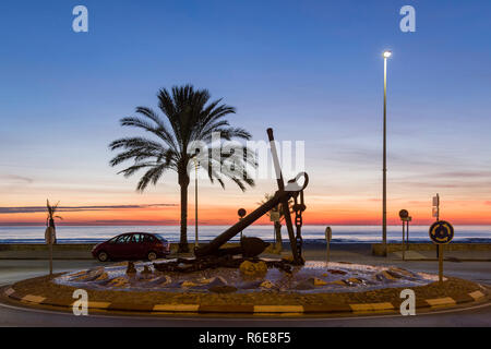 View to the sunrise at the anchor gazebo in Puerto de Sagunto, Valencia, Spain Stock Photo