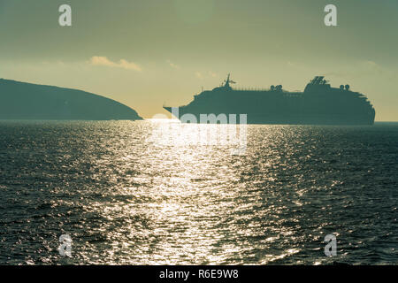 Luxury Cruise liner The World pulls into Falmouth docks in Cornwall for an overnight stop at one of Cornwalls most iconic destinations. Stock Photo