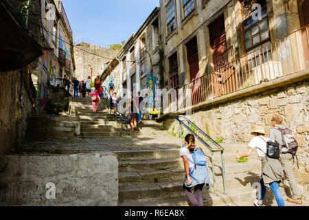 Porto, Portugal - September 16, 2018 : People ascending the Rua Stairs of the Codeçal in the city of the Porto, Portugal Stock Photo