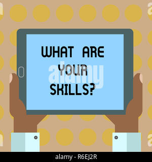Word writing text What Are Your Skillsquestion. Business concept for Tell us your abilities knowledge experience Hu analysis Hand Holding Blank Screen Stock Photo