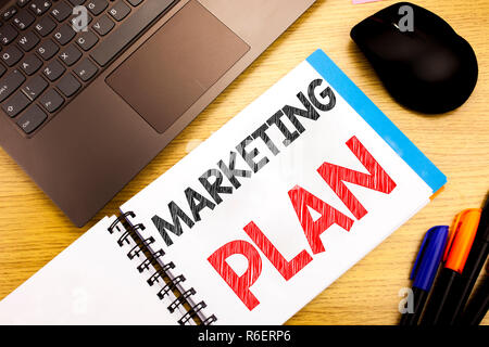 Handwritten text caption showing Marketing Plan. Business concept writing for Planning Successful Strategy written on notepad with copy space on old wood wooden with pen computer Stock Photo