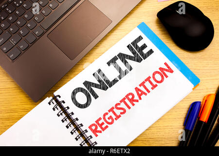 Handwritten text caption showing Online Registration. Business concept writing for Internet Login written on notepad with copy space on old wood wooden with pen computer Stock Photo