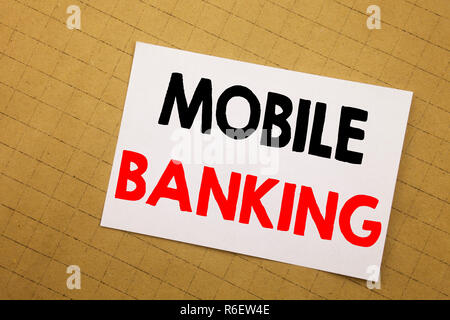 Conceptual hand writing text caption inspiration showing Mobile Banking. Business concept for Internet Banking e-bank Written on sticky note yellow background. Stock Photo