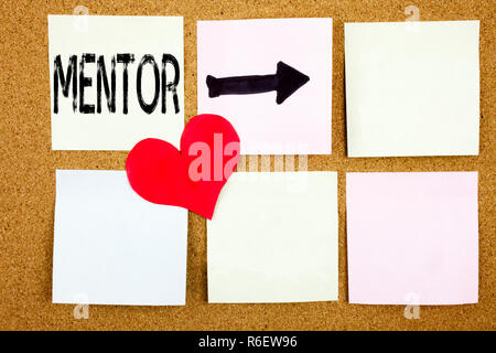 Conceptual hand writing text caption inspiration showing Mentor concept for Guide Teacher Coach Instructor Counsellor Tutor and Love written on wooden background, reminder  background with copy space Stock Photo