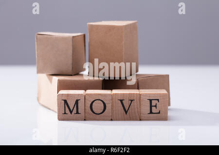 Close-up Of Move Text On Wooden Blocks Stock Photo
