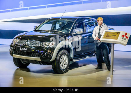 MOSCOW, RUSSIA - AUG 2012: MITSUBISHI L200 4TH GENERATION presented as world premiere at the 16th MIAS (Moscow International Automobile Salon) on Augu Stock Photo