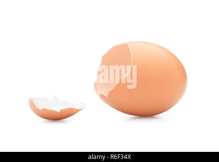 Empty broken egg against white background. Clipping path Stock Photo