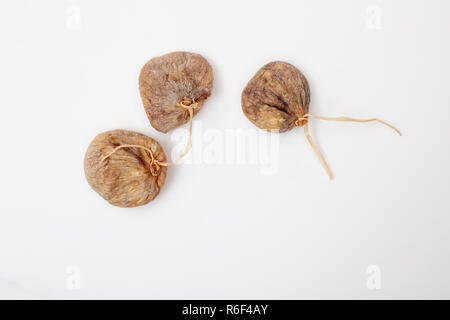Dried figs, Pattern of nuts form. isolated on white background, top view Stock Photo