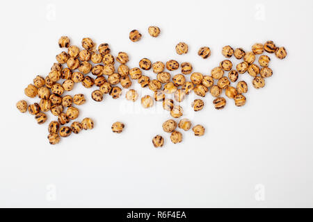 Roasted Chickpeas,  Pattern of nuts form. isolated on white background, top view Stock Photo