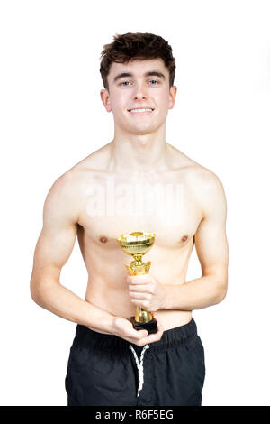 Successful caucasian young adult swimmer isolated on white background with award Stock Photo