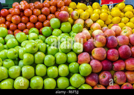 apples,tomatoes and lemons at a market in santiago de chile Stock Photo