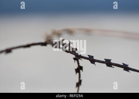 Blurred background with rusty metal wire Stock Photo - Alamy