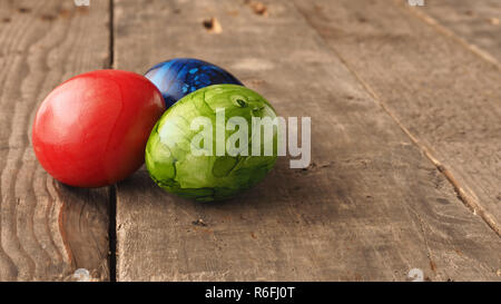colored easter eggs on wood Stock Photo