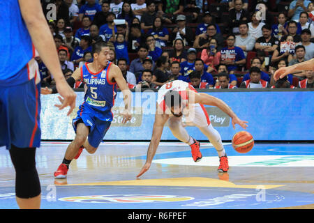 Iran dealt another home loss to the Philippines, 78-70 during their fifth window match in the ongoing 2019 FIBA Basketball World Cup Qualifiers. Iran was led by Mohammad Jamshidi who poured in 26 points for the visiting team in their win. The Philippines, who lost consecutive games at home court, was paced by the returning Jason William who scored 19 points in his first game back from his three-game suspension for his role in the infamous brawl between the Philippines and Australia during their match in the former's home court. The next set of qualifiers will happen on February and the top thr Stock Photo