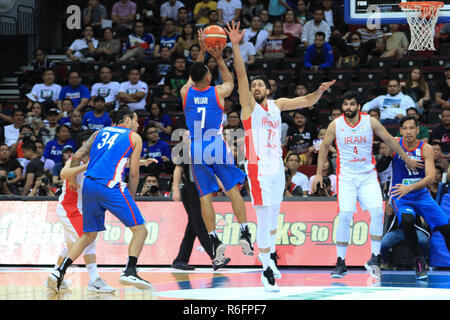 Iran dealt another home loss to the Philippines, 78-70 during their fifth window match in the ongoing 2019 FIBA Basketball World Cup Qualifiers. Iran was led by Mohammad Jamshidi who poured in 26 points for the visiting team in their win. The Philippines, who lost consecutive games at home court, was paced by the returning Jason William who scored 19 points in his first game back from his three-game suspension for his role in the infamous brawl between the Philippines and Australia during their match in the former's home court. The next set of qualifiers will happen on February and the top thr Stock Photo