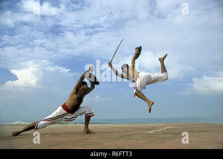 Kalarippayattu, Ancient Martial Art of Kerala, sword and shield fighting, Kerala India Asia Indian Asian MR#777B Stock Photo