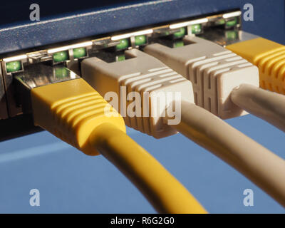 Modem router switch with RJ45 ethernet plug ports Stock Photo