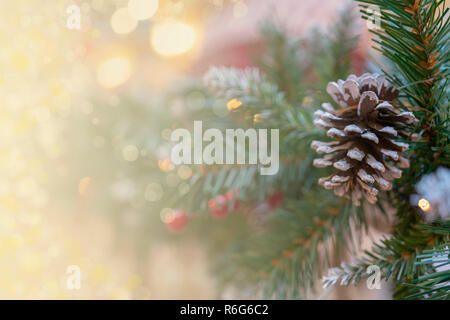 Christmas background - branches, toys, highlights. Place for congratulations. Stock Photo