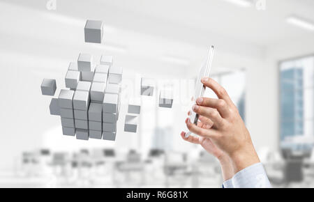 Integrating new technologies concept with cube figure floating i Stock Photo