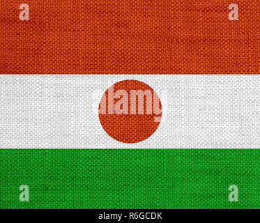Niger flag on rustic old wood surface background Stock Photo - Alamy