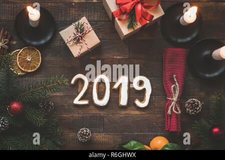 New Year or Christmas table setting with 2019 letters. Winter holidays greeting card. Top view. Authentic table setting Stock Photo