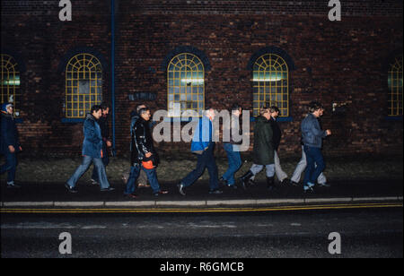 Dinnington Main Colliery, South Yourshire, England. During the Miners strike of 1984 and 1985 Miners seen here members of NACODS return to work towards the end of the NUM strike in 1985 Dinnington Main Colliery was a coal mine situated in the village of Dinnington, near Rotherham, South Yorkshire, England.  Until the coming of the colliery Dinnington was a mainly agricultural village with a small amount of quarrying in the area.  In 1899 preparations were being made by the Sheffield Coal Company to sink a new colliery at Dinnington. The company did not have the resources to complete the work a Stock Photo